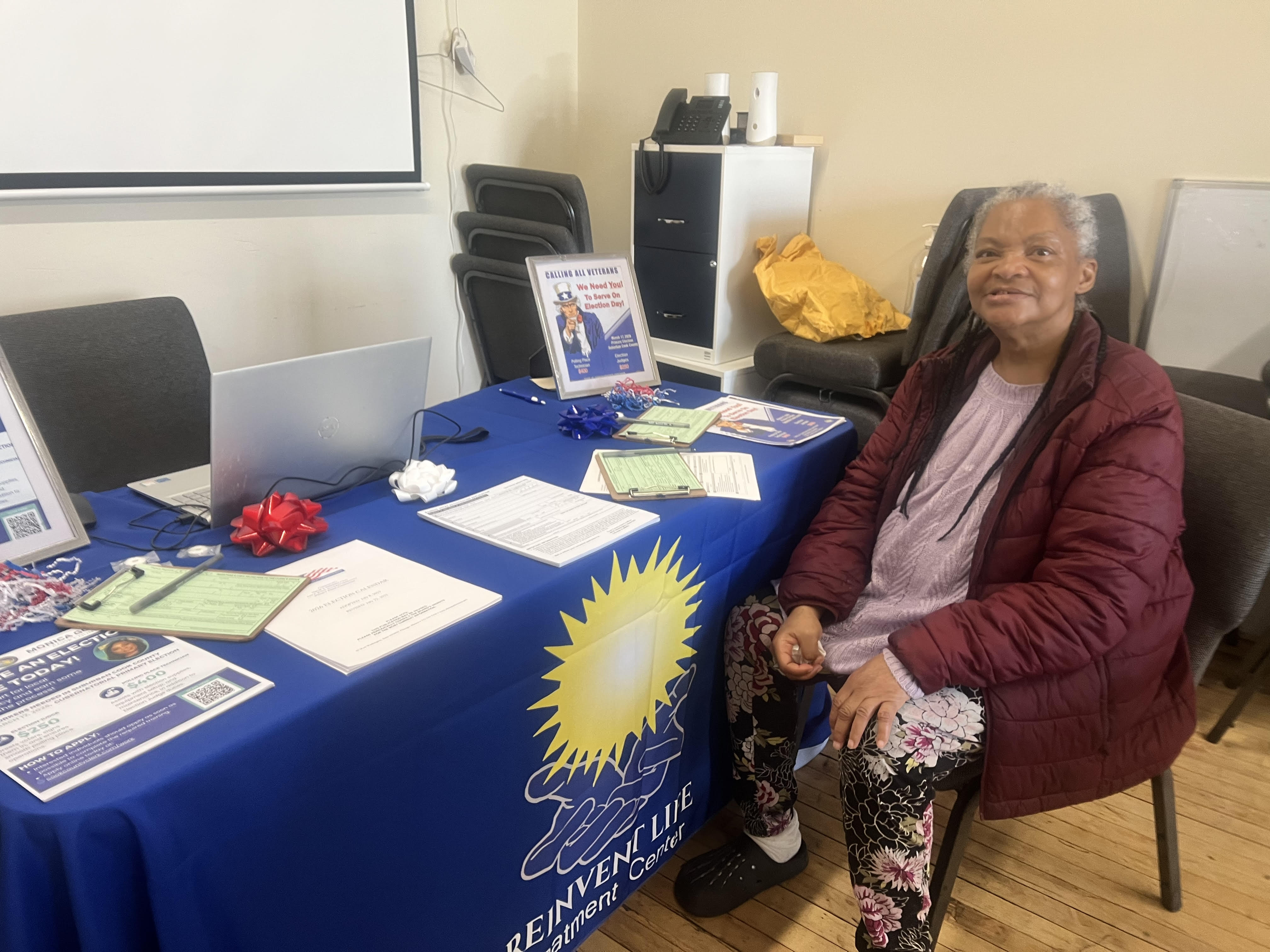 Participant holding voter registration form