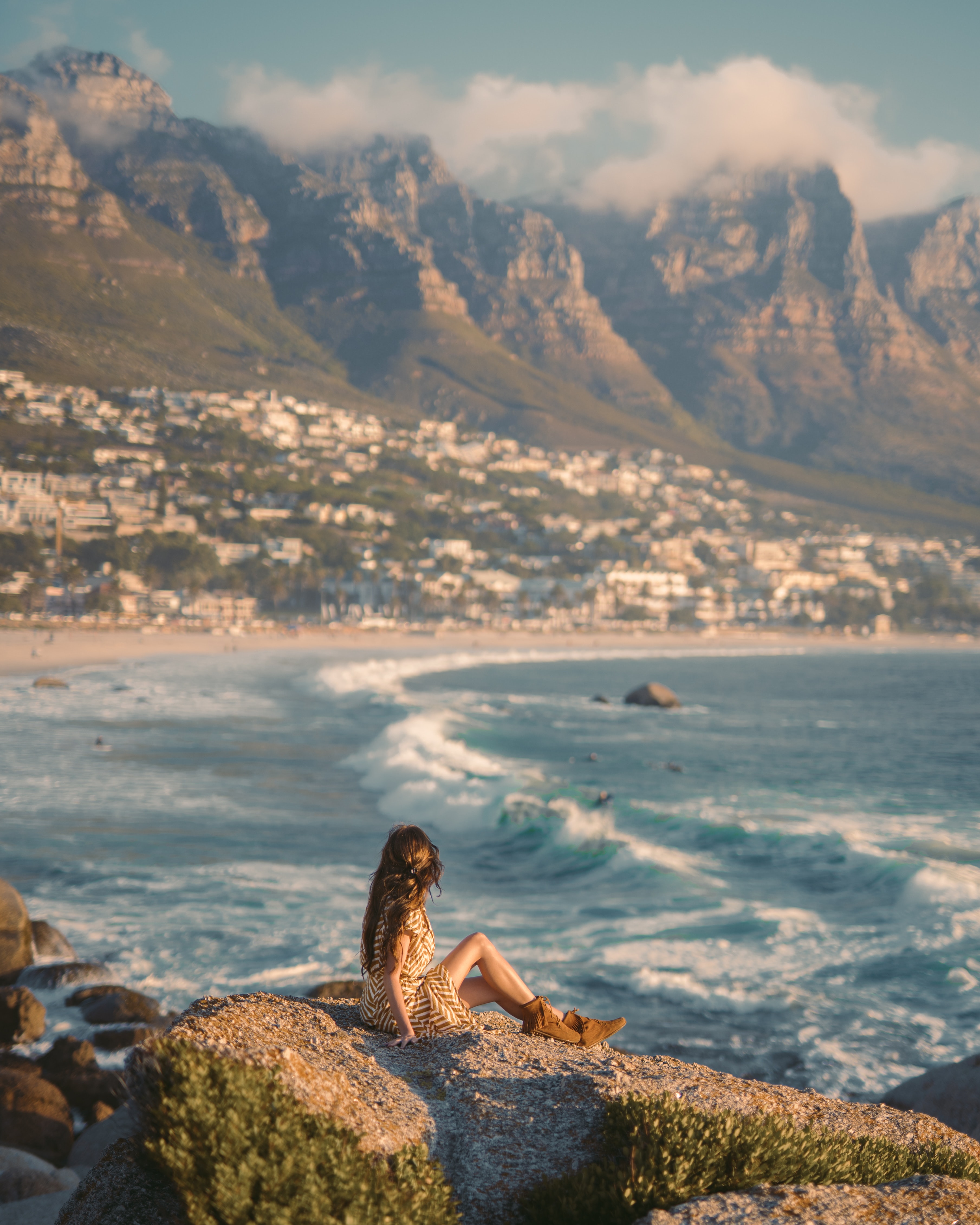 Woman in peaceful contemplation by the ocean